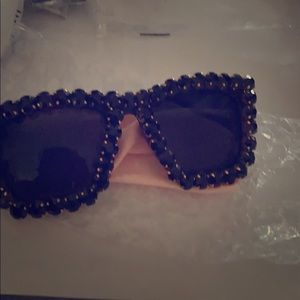 Brand new all black sunglasses come with the case